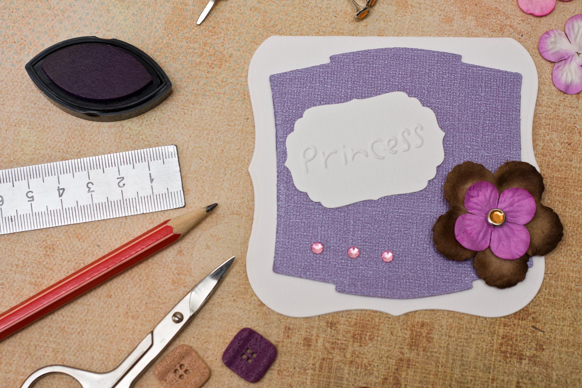 Series of embroidered patches on table